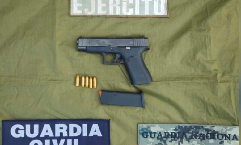 Pistola asegurada