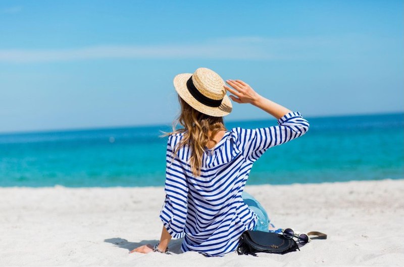Vacacionista en la playa