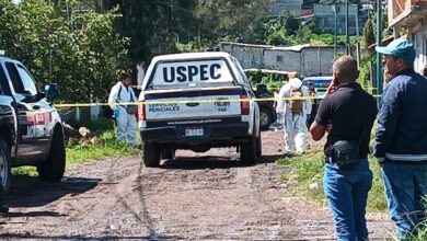 Camioneta de la USPEC en la escena del crimen
