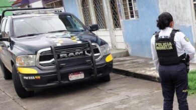 Patrulla y agente de la Policía Morelia