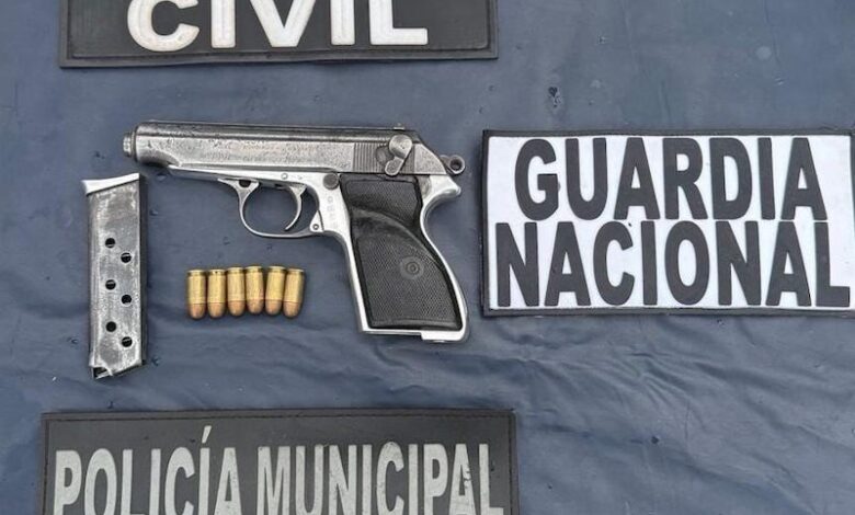 Pistola asegurada