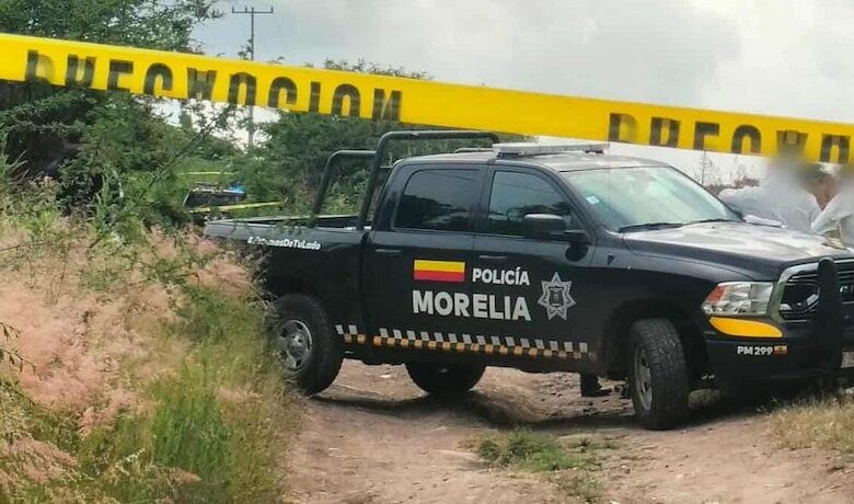 Patrulla de la Policía Morelia en zona acordonada