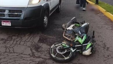Ambulancia y motocicleta accidentada