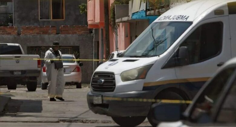 Ambulancia y zona acordonada